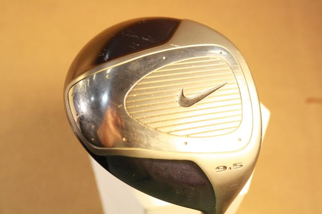 SCRATCHES ON TOP OF CLUB FACE AND ON TOP OF CLUB HEAD.